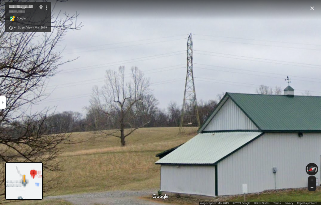 [tree, electric tower, building] 