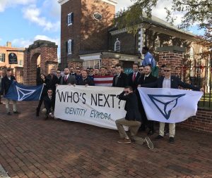 "Ajax" at center behind the banner.