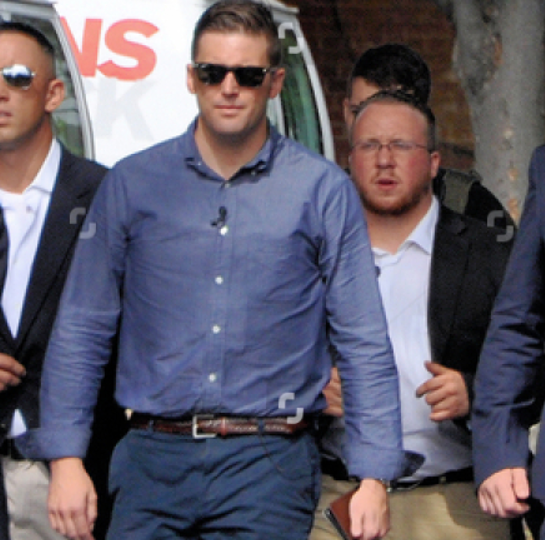 "Jack Pierce" behind Richard Spencer, Charlottesville, 12 Aug 2017.