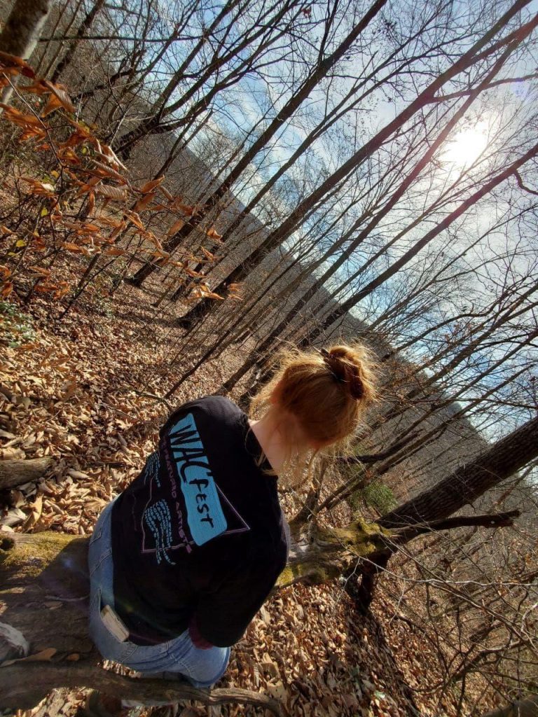 Photo of daughter "Branka" wearing a shirt bearing the logo of the "White Art Collective" (WAC), a group of white nationalist writers, artists and musicians.