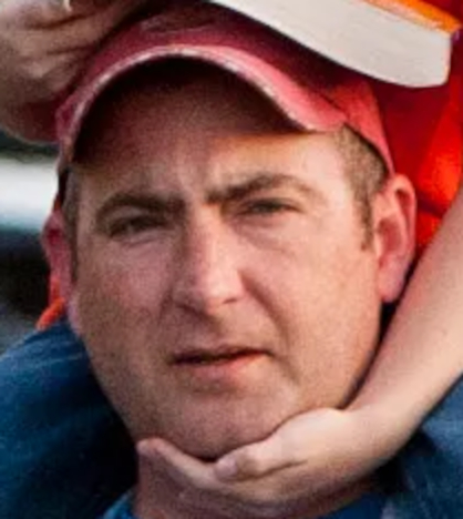 Photo of Aaron Nichols in 2011, enlarged 2x (photo is cropped to preserve the privacy of his family members).