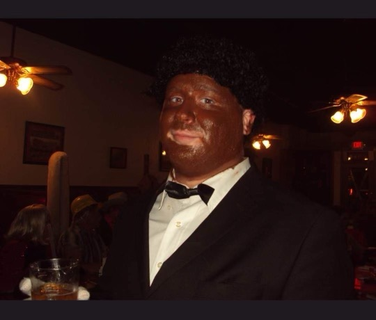 Logan Lawrence in "black face" make up for Halloween one year.